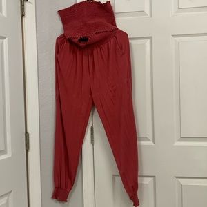 This is a matching set of a burgundy tube top with stretchy waisted pants